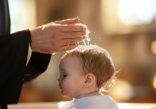 An image capturing the sacred ceremony of a baby's baptism inside a church, showing a clergyman pouring holy water on the infant's head, symbolizing spiritual initiation.